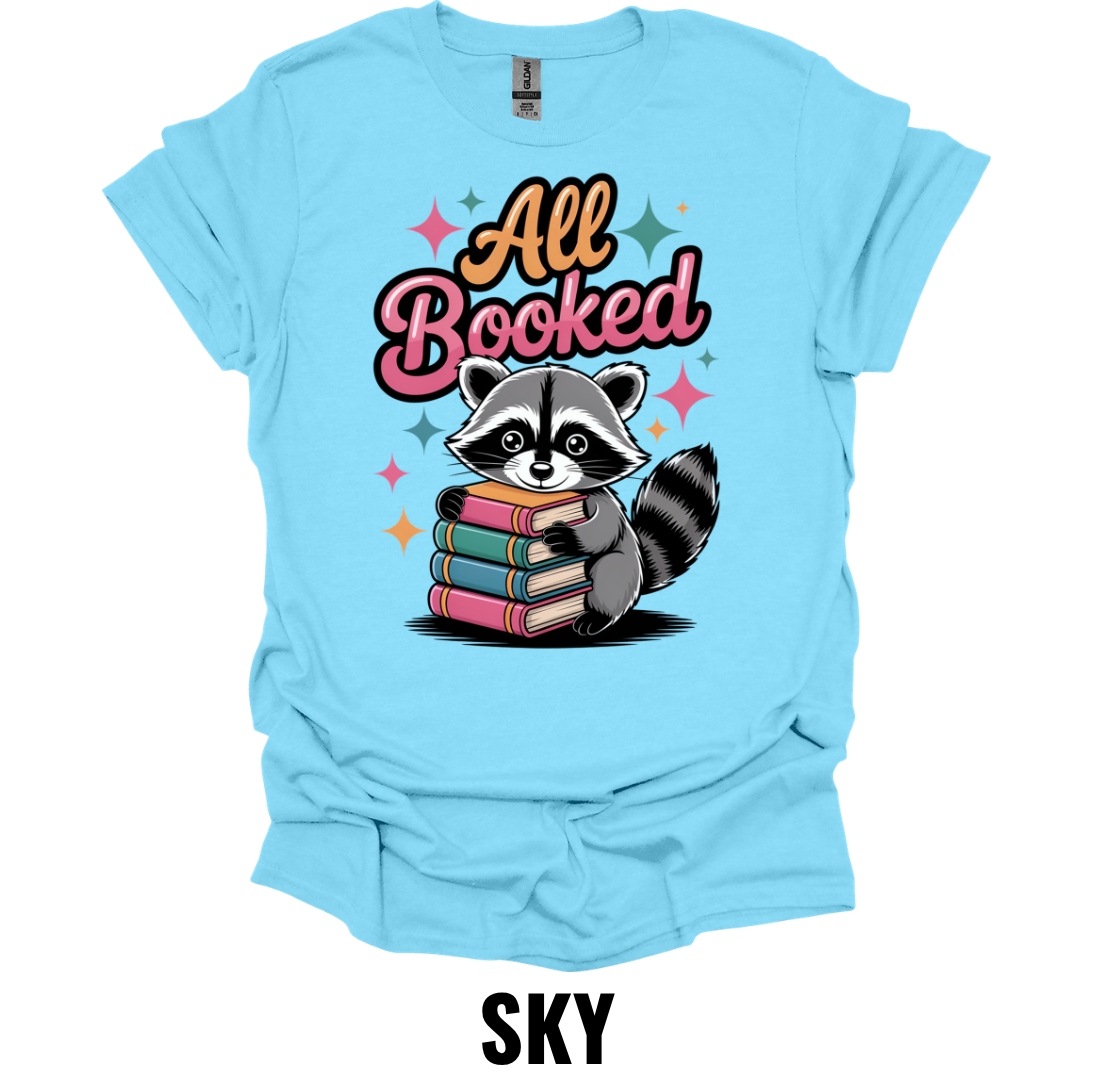 All Booked Shirt – Book Lover Raccoon Graphic T-Shirt