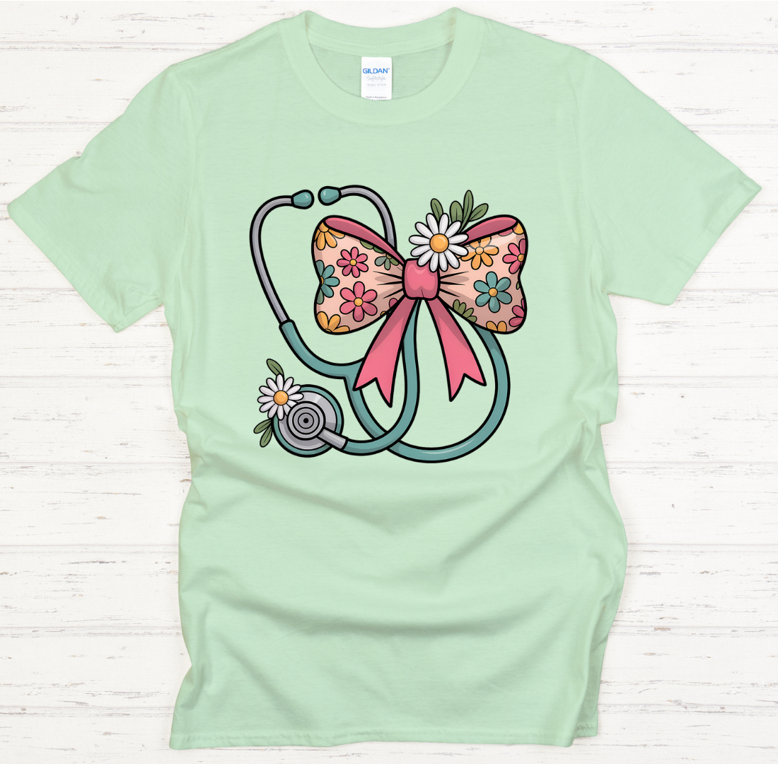 Floral Stethoscope Bow Nurse Graphic Shirt on Gildan Softstyle Tee